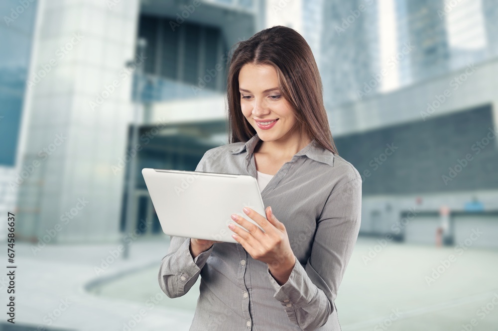 Portrait of successful business woman hold digital tablet Portrait of successful business woman hold digital tablet