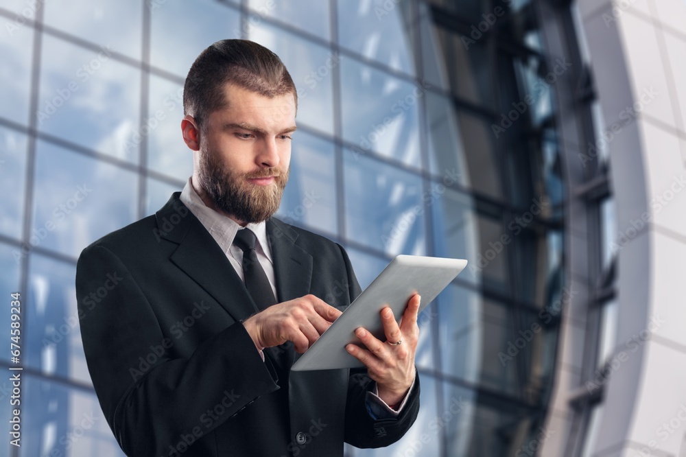 Young handsome happy business man with digital tablet Young handsome happy business man with digital tablet