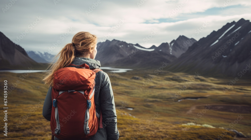 rear view traveller backpacker hiking walking up on top the landscape mountain looking at the contour of beautiful mountain peak and field nature scenery view point travel background concept rear view traveller backpacker hiking walking up on top the landscape mountain looking at the contour of beautiful mountain peak and field nature scenery view point travel background concept