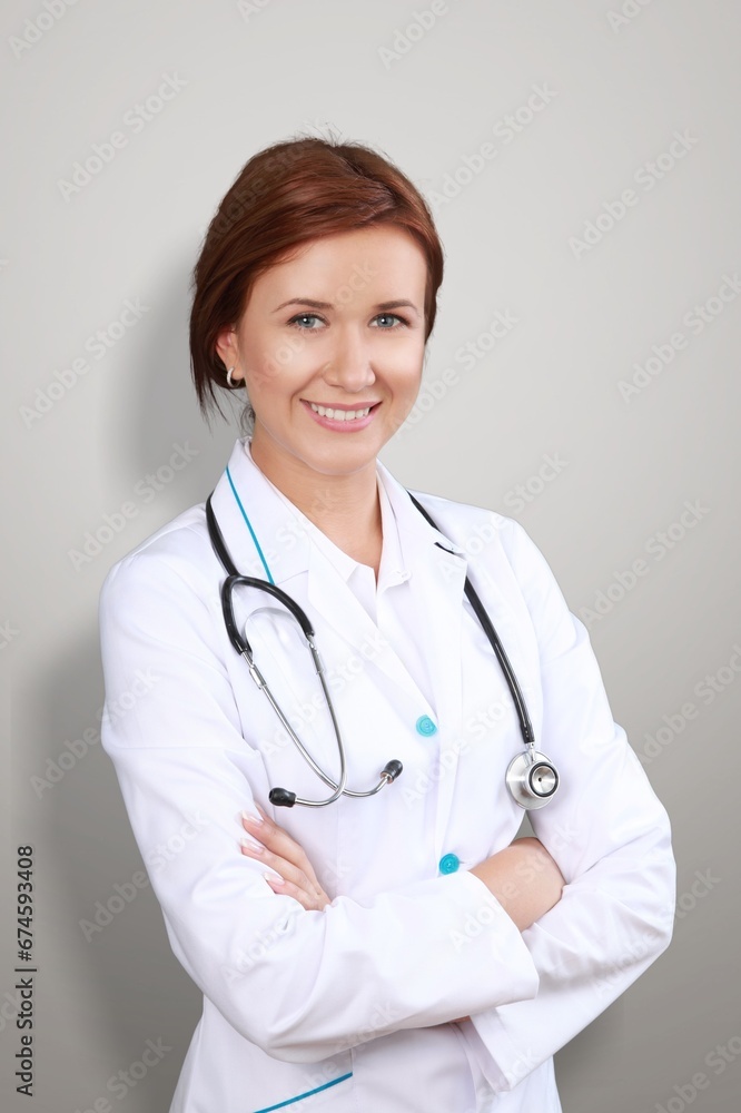 Happy beautiful young female doctor. Health care concept Happy beautiful young female doctor. Health care concept