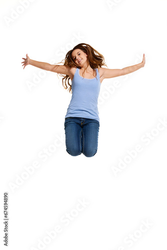 Happy, joyful, funny girl, student jumping raised her hands up on white studio background. Concept of beauty, youth, human emotions, fashion, style, modelling, sales, shop, Black Friday. Copy space.