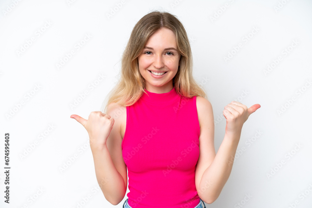 Blonde English young girl isolated on white background with thumbs up gesture and smiling Blonde English young girl isolated on white background with thumbs up gesture and smiling