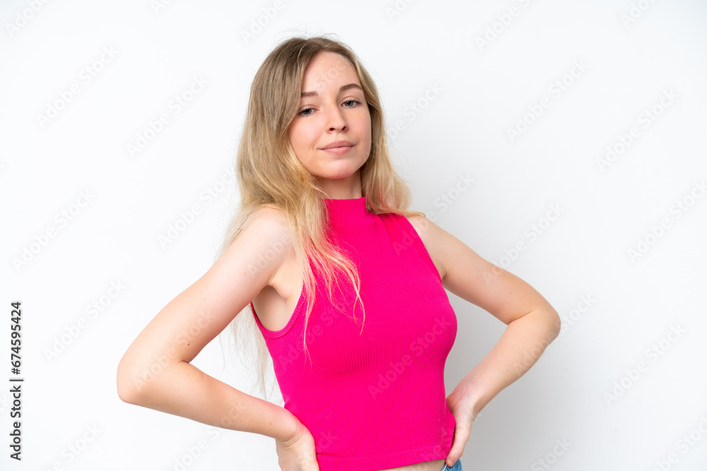 Blonde English young girl isolated on white background suffering from backache for having made an effort Blonde English young girl isolated on white background suffering from backache for having made an effort