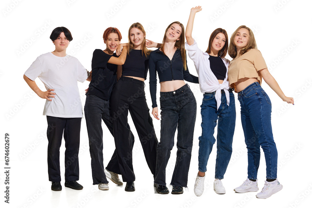 Full-length portrait of young attractive smiling people dressed trendy casual outfit against white studio background. Concept of beauty, youth, emotions, fashion, style, modelling. Copy space. Ad