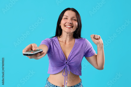 Joyful young woman with rem...