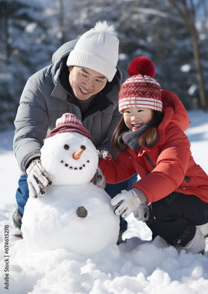 asian child makes snowman in winter, childhood, white snow, kid, outdoor fun, new year, holidays, christmas, family, walk in the park, parents, together, happy, smile, love, dad, joy, korean, chinese