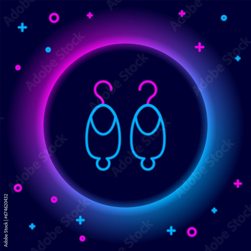 Glowing neon line Earrings icon isolated on black background. Jewelry accessories. Colorful outline concept. Vector