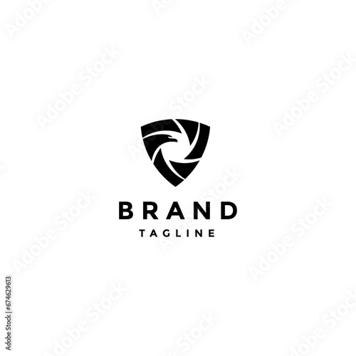 Shutter Guard Eagle Logo Design. Shield Icon with Camera Shutter Motif with Eagle Head Logo Design.