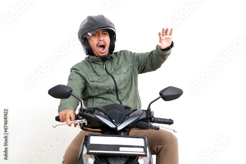 Shocked asian man having trouble or accident while riding a motorcycle. Isolated on white background