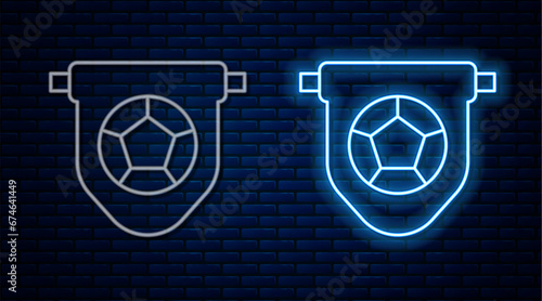 Glowing neon line Football or soccer flag pennant icon isolated on brick wall background. Vector