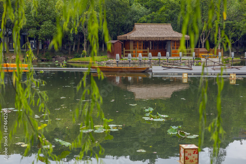 The scenerywith ponds and willows, and famous pagoda tower, Xi Shi's park in Zhuji, Zhejiang Province, China photo