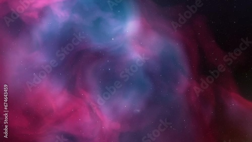 Space background. Camera is flying through the blue and magenta coloured nebula. The stars are everywhere around
