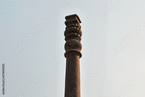 Iron pillar of Delhi structure part Qutb complex in South Delhi, India, rust resistant iron pillar photo