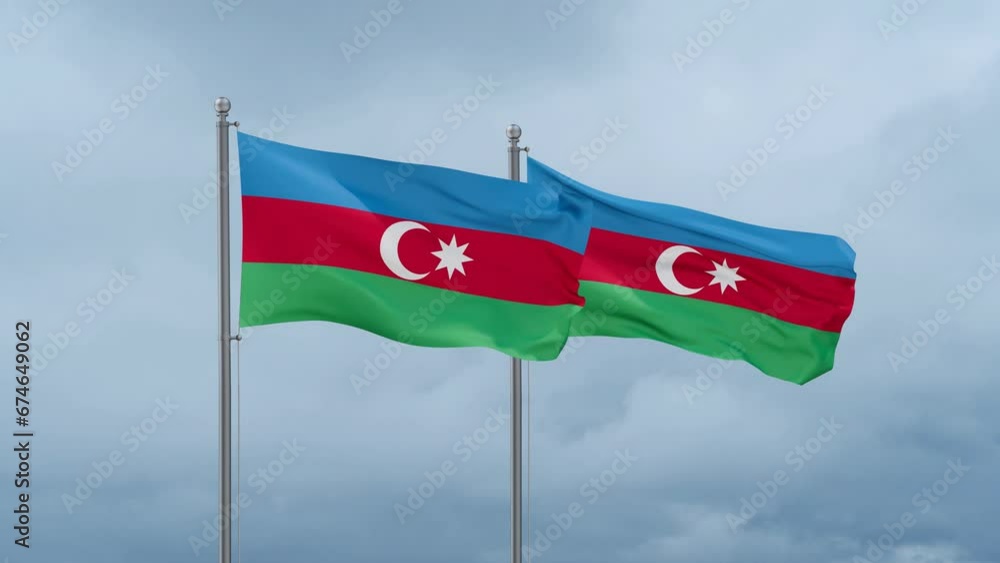 Two Azerbaijan flag waving together on cloudy sky, endless seamless loop, two country cooperation concept Two Azerbaijan flag waving together on cloudy sky, endless seamless loop, two country cooperation concept
