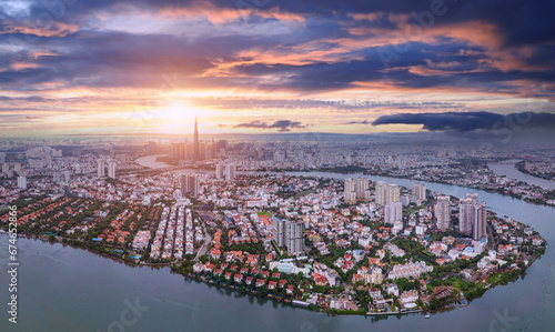 Aerial panorama of Ho Chi Minh city at sunset, Vietnam photo