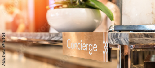 Concierge service, reception desk counter at frontdesk of hotel with hospitality staff team working for tourist business customer