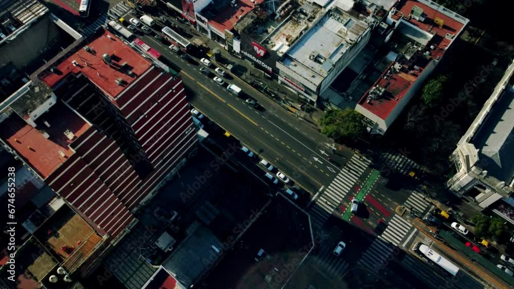 Road traffic in city. Copter top view on urban street and cars, buildings. Road traffic in city. Copter top view on urban street and cars, buildings.