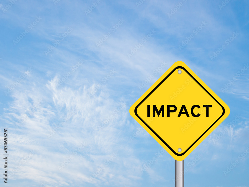 Yellow transportation sign with word impact on blue color sky background Yellow transportation sign with word impact on blue color sky background
