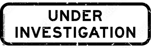 Grunge black under investigation word square rubber seal stamp on white background