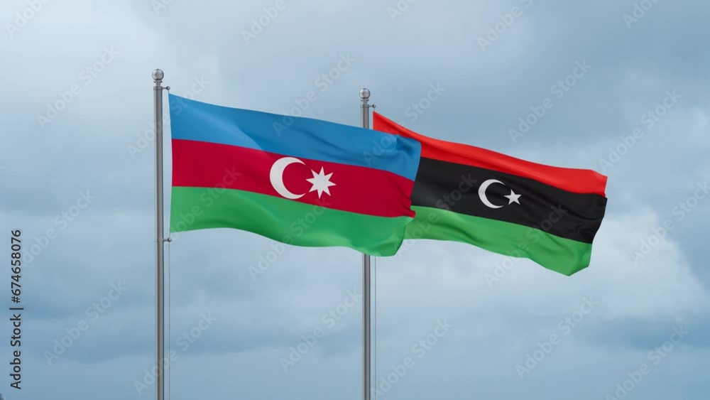 Libya and Azerbaijan flag waving together on cloudy sky, endless seamless loop, two country cooperation concept Libya and Azerbaijan flag waving together on cloudy sky, endless seamless loop, two country cooperation concept