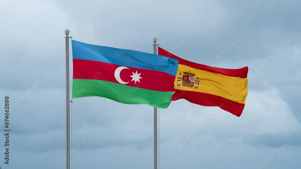 Spain and Azerbaijan flag waving together on cloudy sky, endless seamless loop, two country cooperation concept Spain and Azerbaijan flag waving together on cloudy sky, endless seamless loop, two country cooperation concept