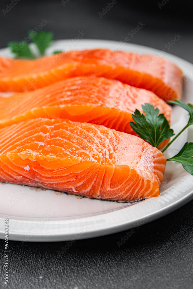 raw salmon red fish fillet pieces fresh delicious healthy eating cooking appetizer meal food snack on the table copy space food background rustic top view raw salmon red fish fillet pieces fresh delicious healthy eating cooking appetizer meal food snack on the table copy space food background rustic top view