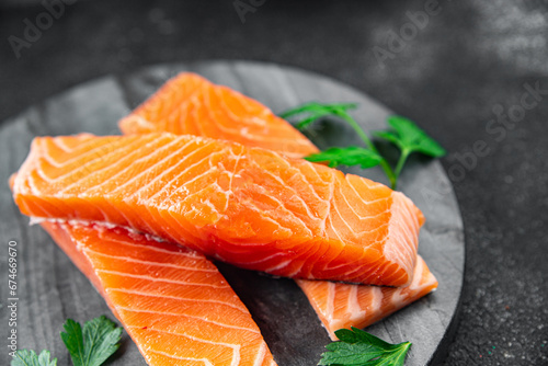 raw salmon red fish fillet pieces fresh delicious healthy eating cooking appetizer meal food snack on the table copy space food background rustic top view