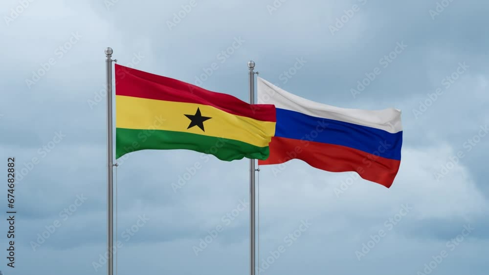 Russian Federation and Ghana flag waving together on cloudy sky, endless seamless loop Russian Federation and Ghana flag waving together on cloudy sky, endless seamless loop