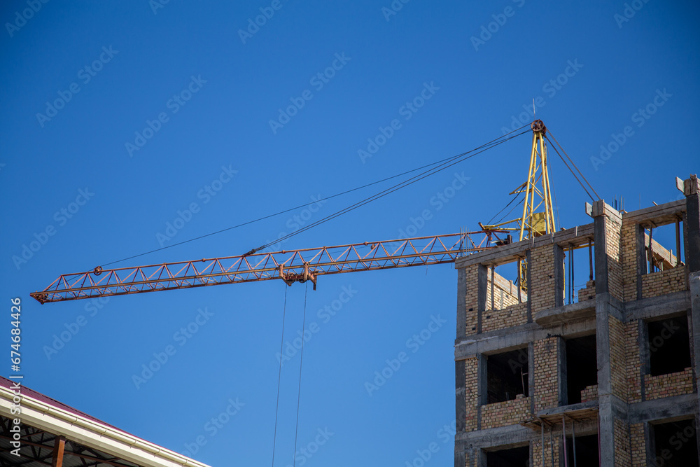 a huge Contracting site with a half constructed building a huge Contracting site with a half constructed building