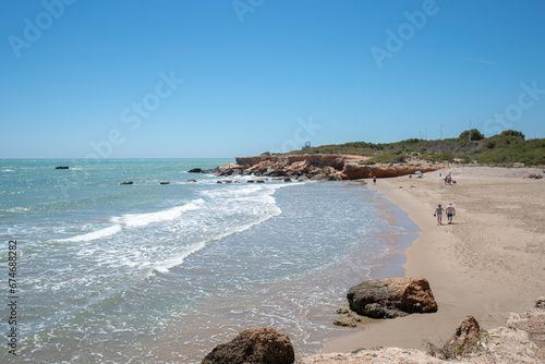 Fototapeta Naklejka Na Ścianę i Meble -  Beach on a sunny day. Mediterranean coast, sea. Alcossebre, Valencia Spain. 