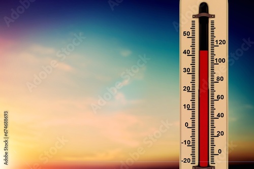 Thermometer with red degrees on sky background