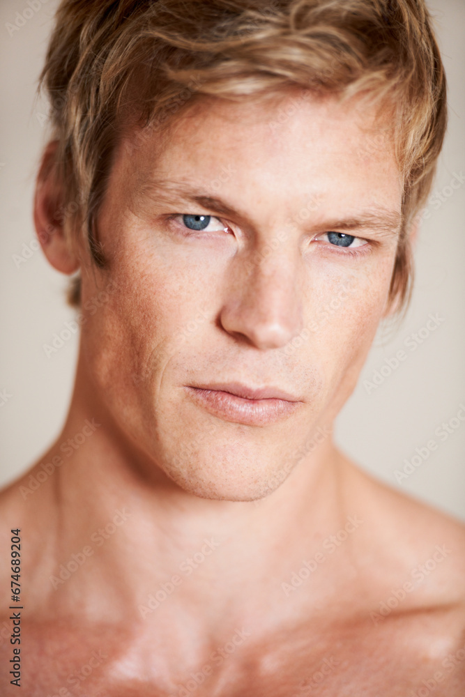 Man, portrait and shirtless confident or studio white background, strength or pride. Male person, model and face serious for topless strong neck or shoulders bare or attractive, cool muscle in Norway Man, portrait and shirtless confident or studio white background, strength or pride. Male person, model and face serious for topless strong neck or shoulders bare or attractive, cool muscle in Norway