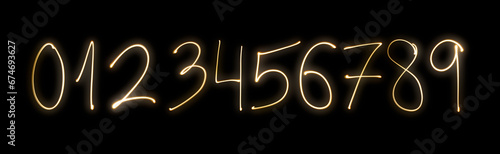 Neon handwritten doodle numbers design elements glowing light. High quality photo