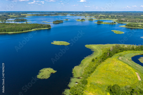 Drone shot on summer lake. Bird-eye view on summer lake.
