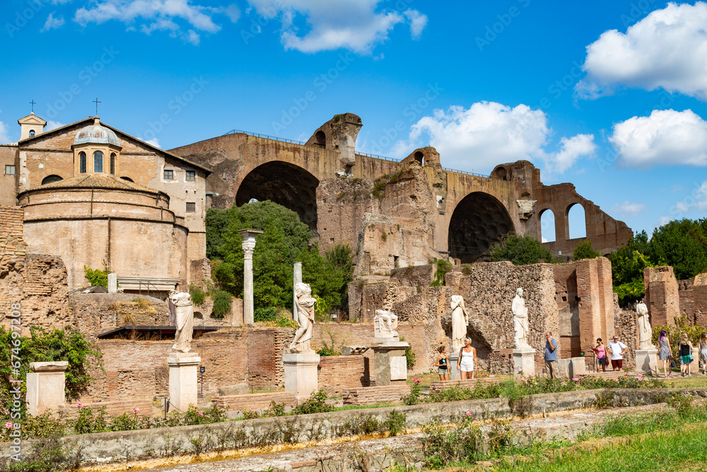 Monuments of the Roman Forum with the statues of the high priestesses of Vesta and the Basilica of Maxentius and Constantine. Rome, Italy