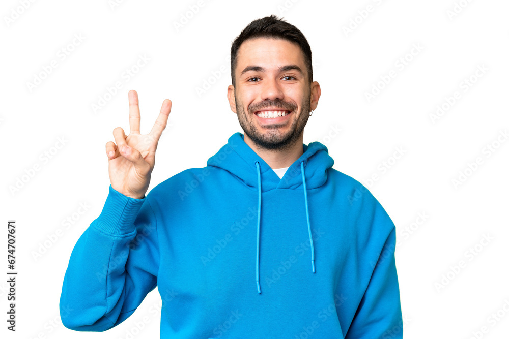 Young handsome caucasian man over isolated chroma key background smiling and showing victory sign Young handsome caucasian man over isolated chroma key background smiling and showing victory sign