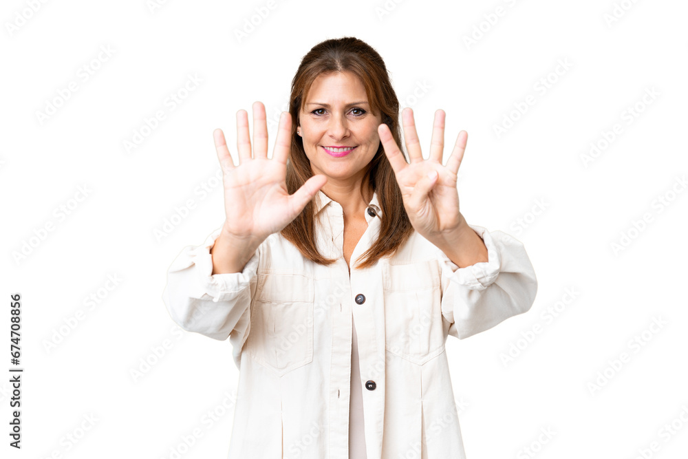 Middle age woman over isolated background counting nine with fingers Middle age woman over isolated background counting nine with fingers