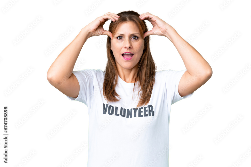 Middle age volunteer woman over isolated background with surprise expression Middle age volunteer woman over isolated background with surprise expression