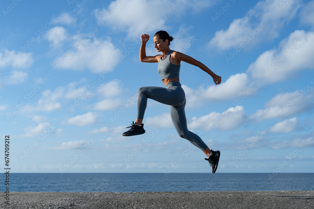 athletic brunette girl doing fitness doing exercises leading a healthy lifestyle athletic brunette girl doing fitness doing exercises leading a healthy lifestyle