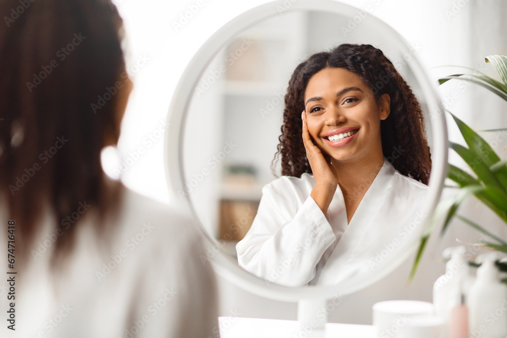 Portrait Of Beautiful Young Black Woman Looking In Mirror At Her Reflection Portrait Of Beautiful Young Black Woman Looking In Mirror At Her Reflection