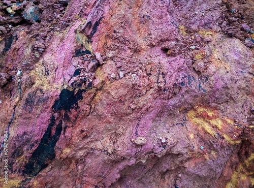 Tropical swamp soils. Bright red-yellow purple soils of Africa. Erosion of an old lateritic soil. Equatorial Guinea.