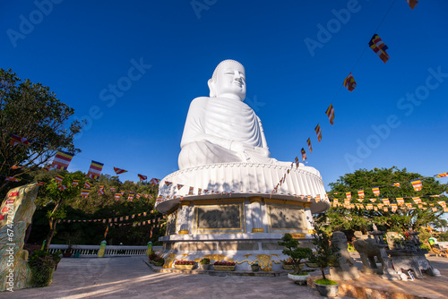 Big white budhha image at Ba Na Hill french village on the hill. The famous toursit attraction in central Vietnam. photo