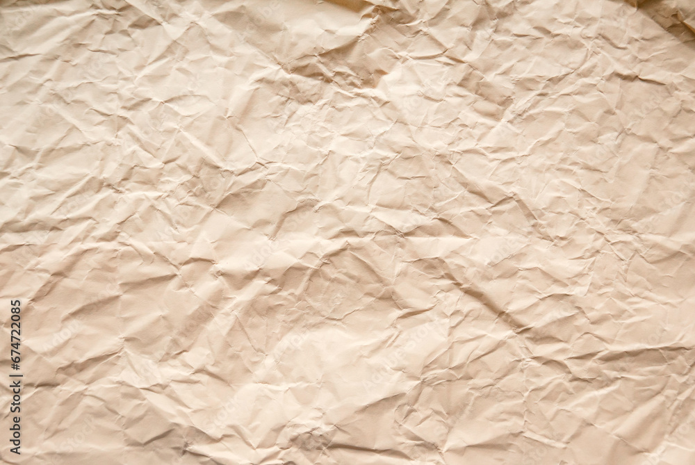 Obraz premium Peach color crumpled paper for background.