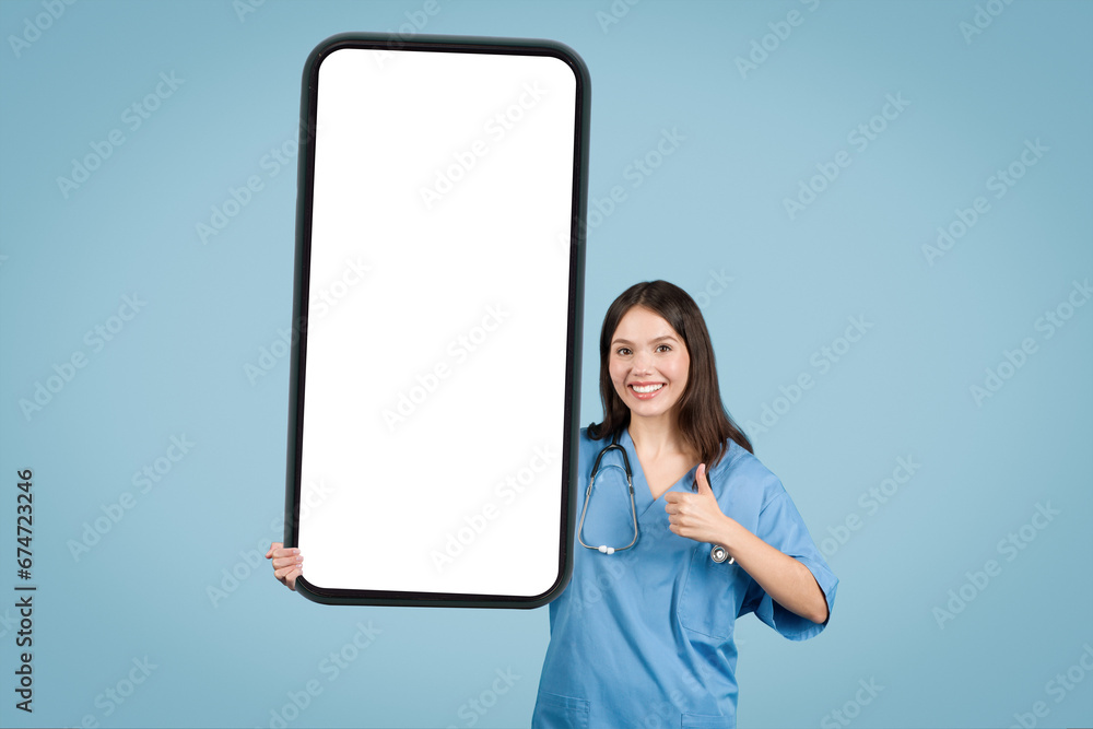 Nurse presenting huge blank mobile phone screen Nurse presenting huge blank mobile phone screen