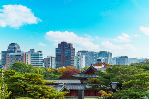 Autumn of Korean tradition architectural of Changgyeonggung Palace and modern building cityscpae modern office view background  Seoul  Republic of Korea