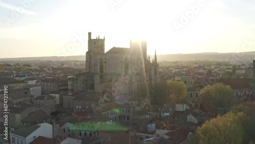 Narbonne, South of France, Occitanie, drone footage, 4K resolution, high-definition, historic, cathedral, Gothic architecture, aerial view, skyline, French Riviera, heritage, culture, tourism, travel,