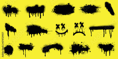 Graffiti vector illustration set, black spray paint drips, splatters, smudges on yellow background. Urban, street art, grunge designs. photo