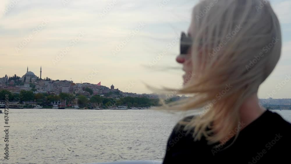 Cruise ship vacation woman enjoying sunset on travel at sea. Elegant happy woman looking at bosphorus in Istanbul, Turkey at sunset. Happy cruise woman resting on deck, Cruise ship vacation woman enjoying sunset on travel at sea. Elegant happy woman looking at bosphorus in Istanbul, Turkey at sunset. Happy cruise woman resting on deck,