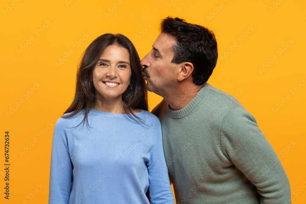 Cheerful senior caucasian man kiss in chick lady, enjoy spare time Cheerful senior caucasian man kiss in chick lady, enjoy spare time