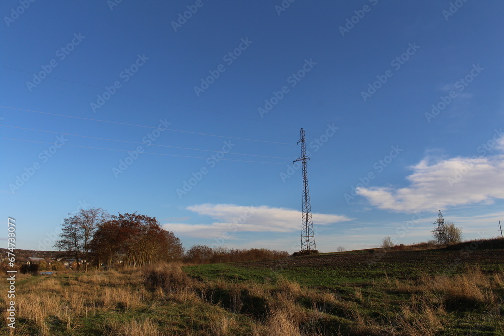 A tall tower in a field A tall tower in a field